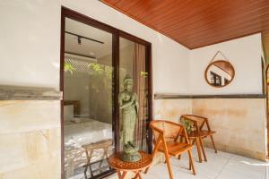 Posezení v ubytování Made Arsa Homestay