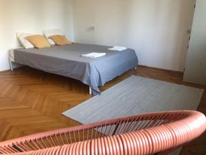 Postel nebo postele na pokoji v ubytování Sobe za EXIT