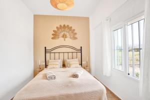 Ένα ή περισσότερα κρεβάτια σε δωμάτιο στο Seaview Apartment Beachlove Les Deveses Denia