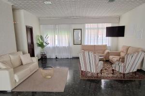 Posezení v ubytování Hotel Cervantes