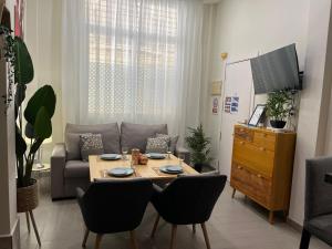 TV a/nebo společenská místnost v ubytování Viento FreshApartments