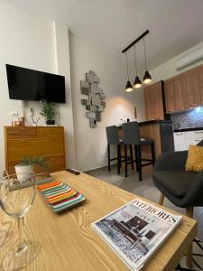 TV a/nebo společenská místnost v ubytování Viento FreshApartments