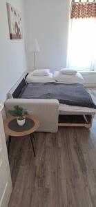 Posteľ alebo postele v izbe v ubytovaní Paradise Apartmanház