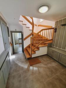 a hallway with a staircase in a house at Willa Tradycja 2 in Gdańsk +38 photos