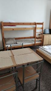 Posteľ alebo postele v izbe v ubytovaní Apartmány Růže