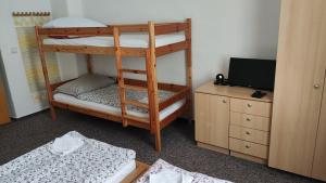 Posteľ alebo postele v izbe v ubytovaní Apartmány Růže