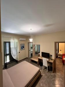 Llit o llits en una habitació de La Flacca Rooms