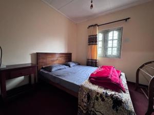 Postel nebo postele na pokoji v ubytování Trinity Guest-Inn