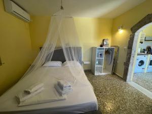 Postel nebo postele na pokoji v ubytování Μικρό Ανάδιο