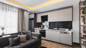 Η κουζίνα ή μικρή κουζίνα στο RÜZGAR LUXURY RESIDENCE +11 φωτογραφίες