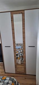Voodi või voodid majutusasutuse Apartments Bajceta toas