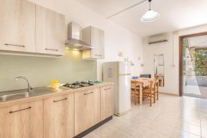 Η κουζίνα ή μικρή κουζίνα στο Residence Elena +31 φωτογραφίες