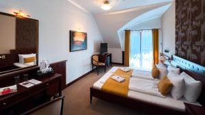 Posezení v ubytování Hotel Tihany Átrium + 37 fotografií
