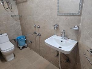 Koupelna v ubytování Sky Bloom Luxury Homestay + 14 fotografií