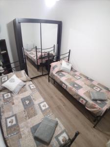 A bed or beds in a room at Mistral Sardegna