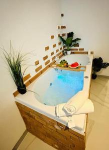 a jacuzzi tub in a room with at Studio Love Jacuzzi in Marseille