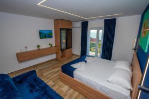 Voodi või voodid majutusasutuse Vila Sela toas
