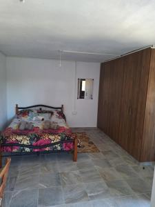Postel nebo postele na pokoji v ubytování Το Κονάτζι