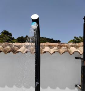 a water fountain on top of a roof at La Noguera Casa Rural in Huéscar
