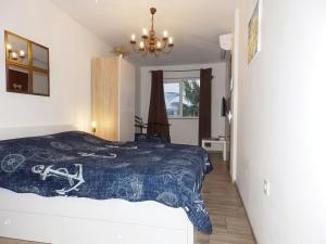 Postel nebo postele na pokoji v ubytování Apartmani Maria - Studio 3