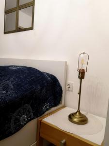 Postel nebo postele na pokoji v ubytování Apartmani Maria - Studio 3