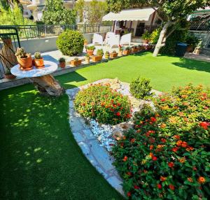 A garden outside Polianthi Seaside House