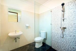 Koupelna v ubytování Made Arsa Homestay