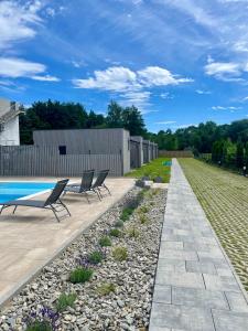 Bazén v ubytování A Morze Domki- Podgrzewany basen, całoroczne klimatyzowane domki, parking nebo v jeho okolí + 22 fotografií