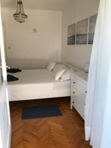 Postel nebo postele na pokoji v ubytování Studio Apartman LENESTA