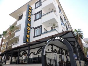 a hotel with a sign on the front of it at Başar hotel in Erdemli
