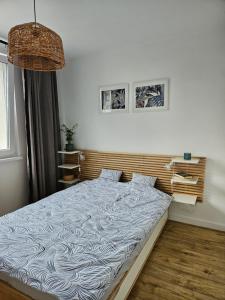 Posteľ alebo postele v izbe v ubytovaní Apartament wakacyjny Brzeźno