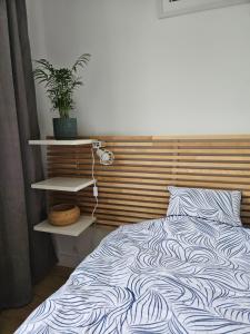 Posteľ alebo postele v izbe v ubytovaní Apartament wakacyjny Brzeźno