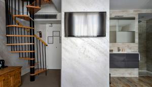 Koupelna v ubytování Hôtel Le Dormeur + 28 fotografií