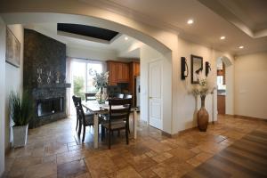 a kitchen and dining room with a table and chairs at 5 BR/5 BA Getaway with a View in Thousand Oaks