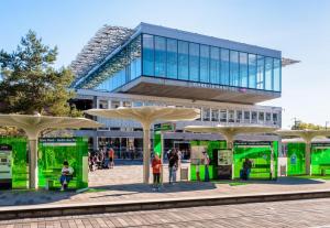 a rendering of a building with umbrellas in front of it at La loge des Carmélites Coeur de Nantes WIFI in Nantes