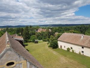 an aerial view of an old building and a yard at Schloss Schrattenthal in Schrattenthal