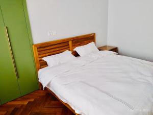 En eller flere senge i et værelse på The Reserve Bed and Breakfast