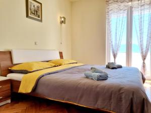 Ένα ή περισσότερα κρεβάτια σε δωμάτιο στο Apartment MIHA