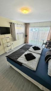 Postel nebo postele na pokoji v ubytování Chloraka Bay Studio