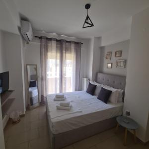 Posteľ alebo postele v izbe v ubytovaní MAGENTA RUBY #DTerra Apartments# FREE PRIVATE PARKING!!