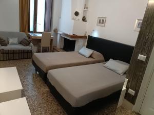 B&B Portanuova客房内的一张或多张床位