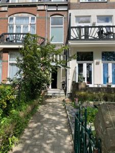 a walkway in front of a house at Multatuli House by Hofstad Studios in Scheveningen