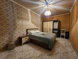 Postel nebo postele na pokoji v ubytování Tamuna House in Tsikhidziri