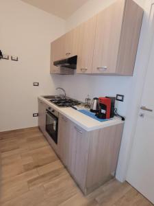 Kuchyň nebo kuchyňský kout v ubytování HOUSE AIRPORT Catania