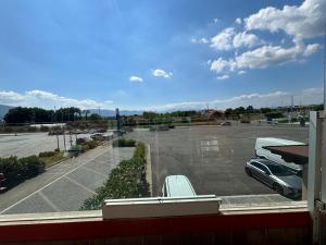 a parking lot with a car parked in it at La Terrazza Ceprano in Ceprano