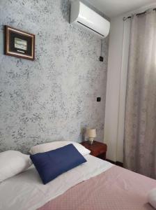 Postel nebo postele na pokoji v ubytování Residence Toscano