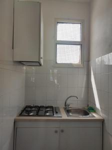 Kuchyň nebo kuchyňský kout v ubytování Residence Toscano