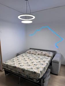 Postel nebo postele na pokoji v ubytování Suite Napoli Stadio