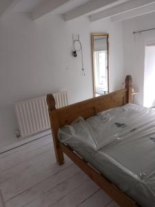 Postel nebo postele na pokoji v ubytování Monk Ensuites