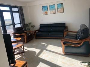 Un lugar para sentarse en wailoaloa CC 泳池公寓